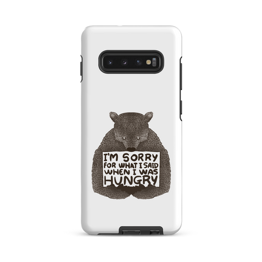 The image shows a humorous, detailed illustration of a bear, drawn in a hand-drawn style, holding a sign that reads 'I'm sorry for what I said when I was hungry.' The bear appears to be apologizing in a comical, endearing manner, making it a relatable and light-hearted design.