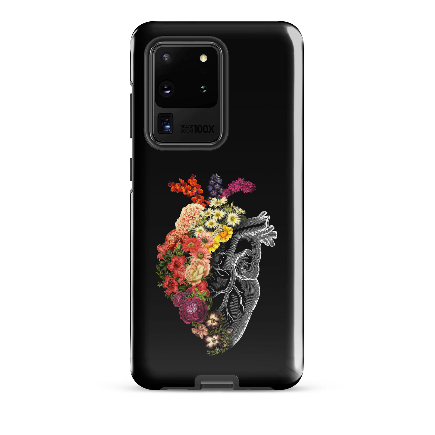 The design is an intricate and anatomical drawing of a human heart on a black background. The left side of the heart morphs into a vibrant assortment of colorful flowers, including roses, daisies, and other blooming blossoms, creating a striking contrast between the realistic and the surreal, symbolizing the harmony between nature and humanity.