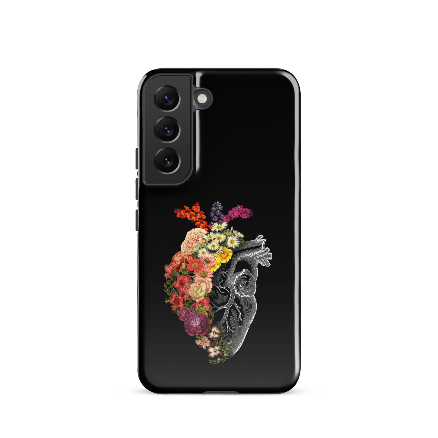 The design is an intricate and anatomical drawing of a human heart on a black background. The left side of the heart morphs into a vibrant assortment of colorful flowers, including roses, daisies, and other blooming blossoms, creating a striking contrast between the realistic and the surreal, symbolizing the harmony between nature and humanity.