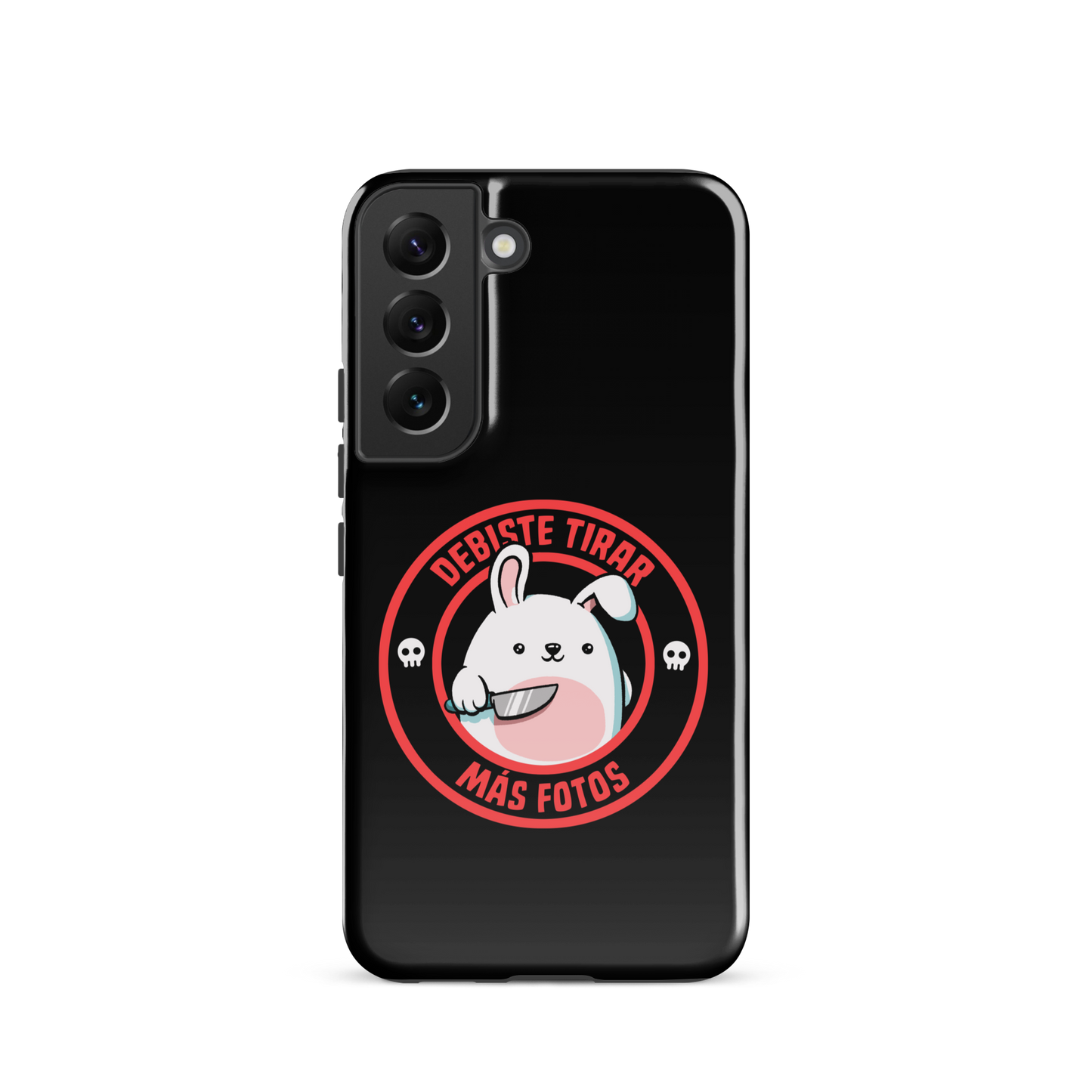 A cute white cartoon bunny with a pink belly stands holding a large kitchen knife in one paw. Surrounding the bunny is a red circular border with the words 'DEBISTE TIRAR MÁS FOTOS'. Small skull icons are on either side of the circle. The overall tone is a mix of adorable and ironic humor.