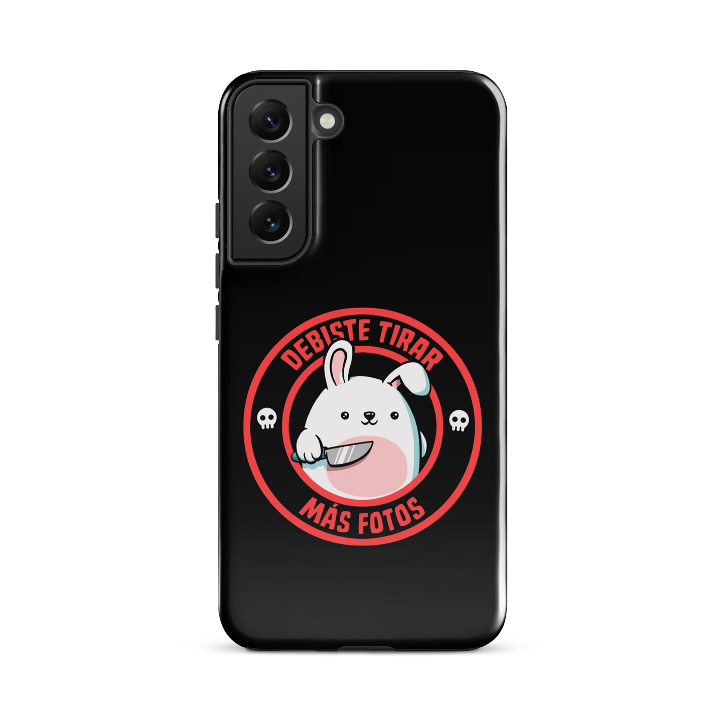 A cute white cartoon bunny with a pink belly stands holding a large kitchen knife in one paw. Surrounding the bunny is a red circular border with the words 'DEBISTE TIRAR MÁS FOTOS'. Small skull icons are on either side of the circle. The overall tone is a mix of adorable and ironic humor.