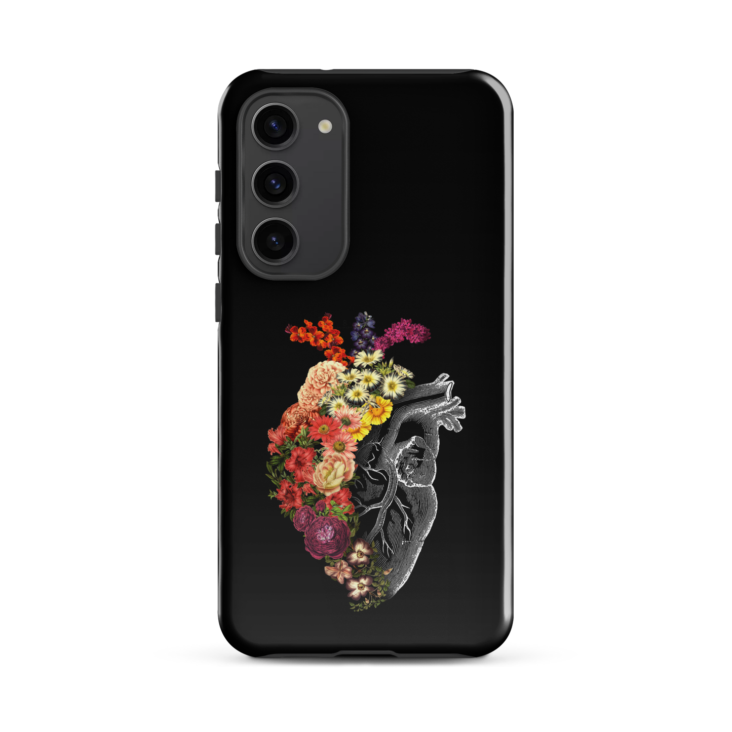 The design is an intricate and anatomical drawing of a human heart on a black background. The left side of the heart morphs into a vibrant assortment of colorful flowers, including roses, daisies, and other blooming blossoms, creating a striking contrast between the realistic and the surreal, symbolizing the harmony between nature and humanity.