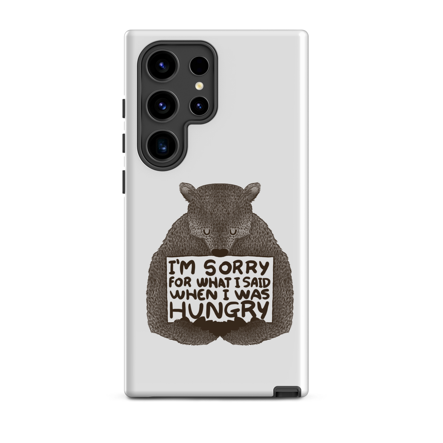 The image shows a humorous, detailed illustration of a bear, drawn in a hand-drawn style, holding a sign that reads 'I'm sorry for what I said when I was hungry.' The bear appears to be apologizing in a comical, endearing manner, making it a relatable and light-hearted design.