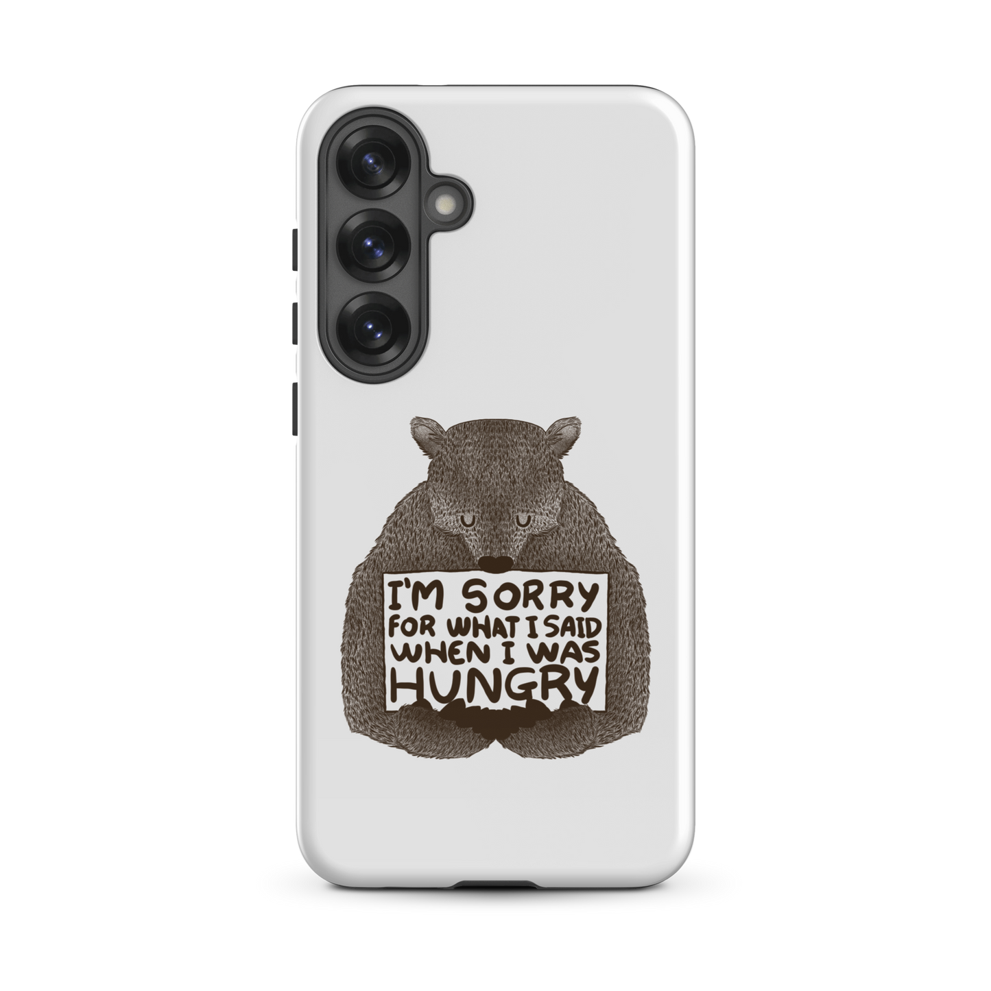 The image shows a humorous, detailed illustration of a bear, drawn in a hand-drawn style, holding a sign that reads 'I'm sorry for what I said when I was hungry.' The bear appears to be apologizing in a comical, endearing manner, making it a relatable and light-hearted design.