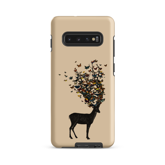 The image depicts a dark, silhouetted deer standing on a neutral background. Instead of branches, its antlers transform into a swirling cloud of vibrant, colorful butterflies that extend upwards and outward. The mix of organic and ethereal elements creates a captivating and whimsical visual contrast.