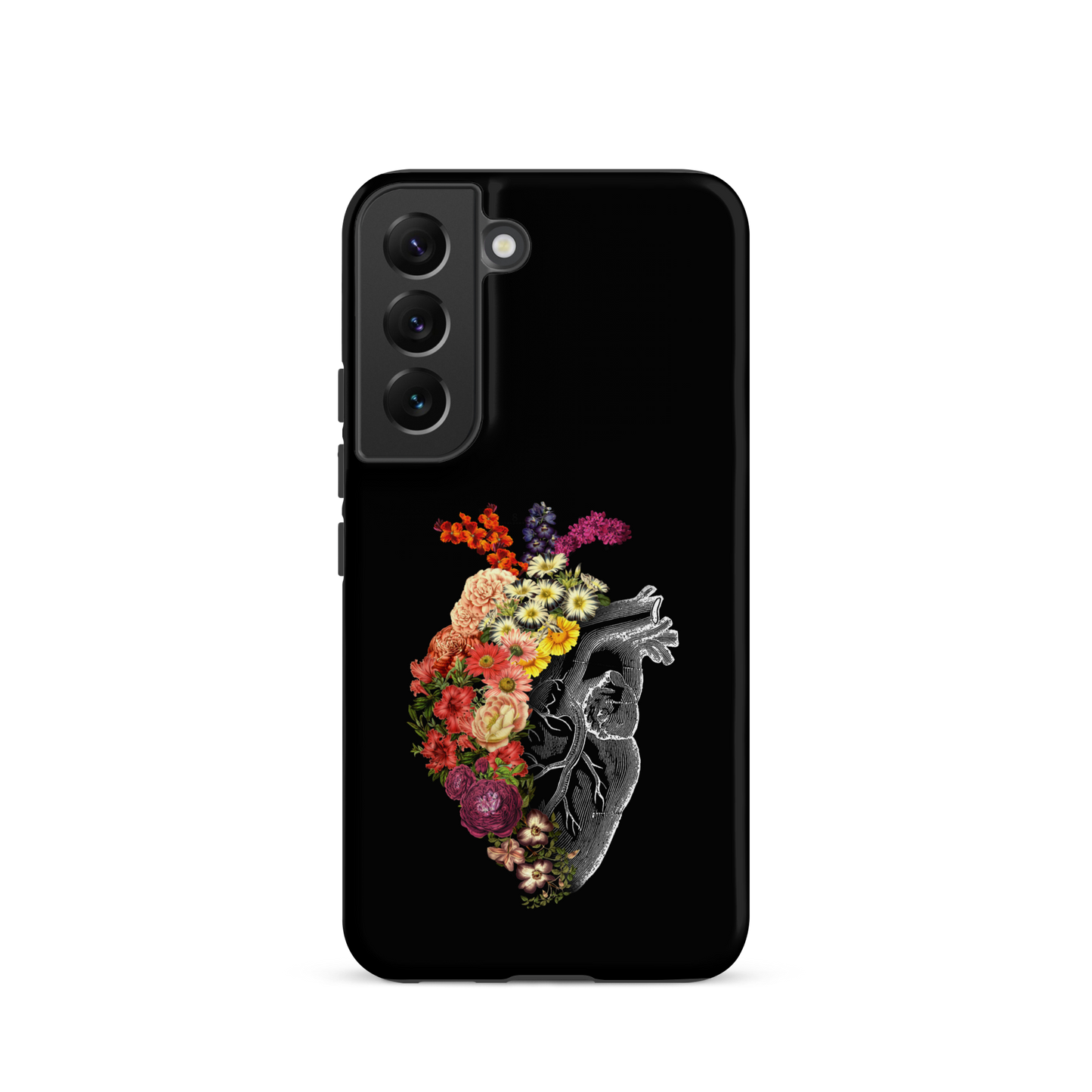 The design is an intricate and anatomical drawing of a human heart on a black background. The left side of the heart morphs into a vibrant assortment of colorful flowers, including roses, daisies, and other blooming blossoms, creating a striking contrast between the realistic and the surreal, symbolizing the harmony between nature and humanity.