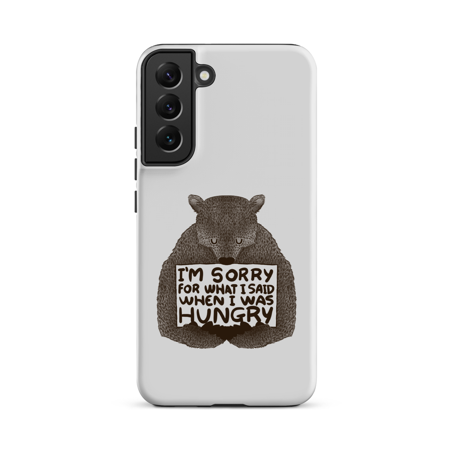 The image shows a humorous, detailed illustration of a bear, drawn in a hand-drawn style, holding a sign that reads 'I'm sorry for what I said when I was hungry.' The bear appears to be apologizing in a comical, endearing manner, making it a relatable and light-hearted design.
