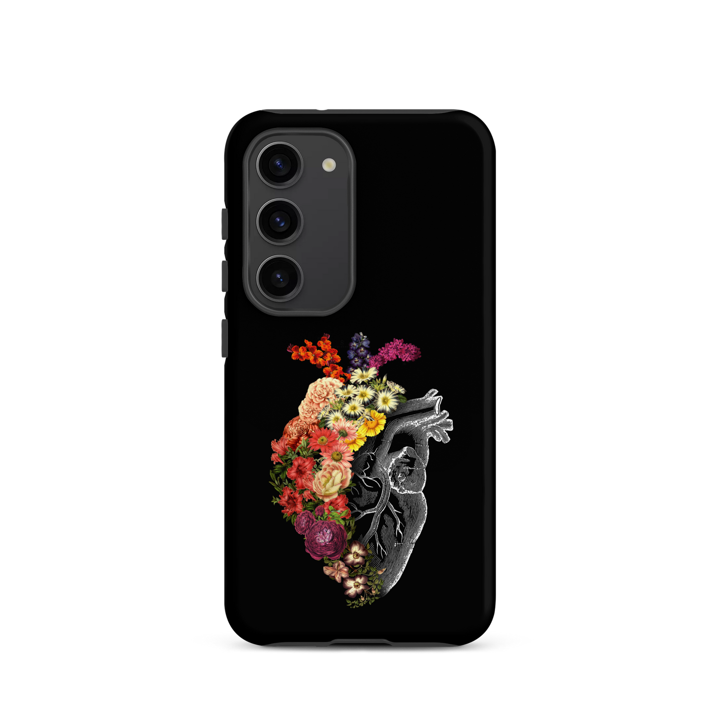 The design is an intricate and anatomical drawing of a human heart on a black background. The left side of the heart morphs into a vibrant assortment of colorful flowers, including roses, daisies, and other blooming blossoms, creating a striking contrast between the realistic and the surreal, symbolizing the harmony between nature and humanity.