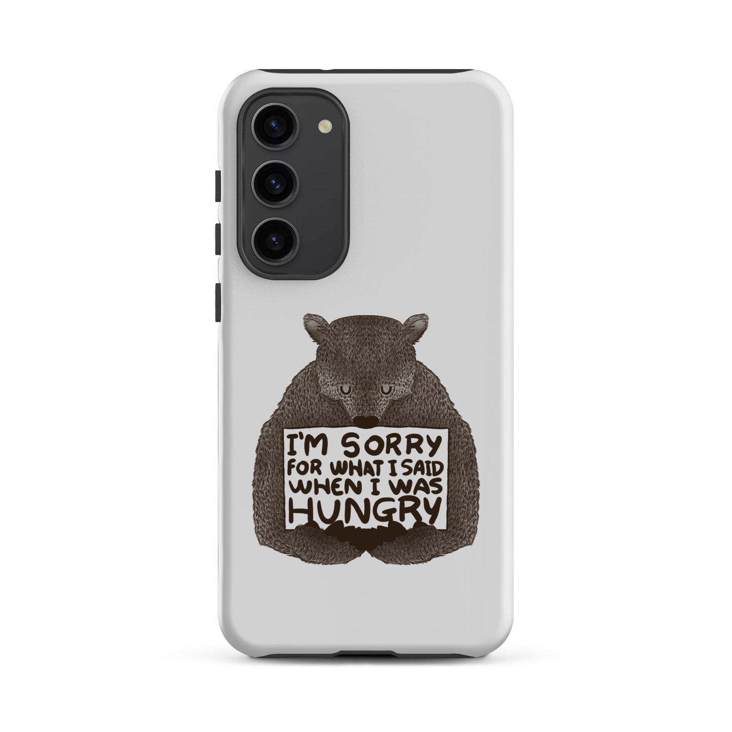The image shows a humorous, detailed illustration of a bear, drawn in a hand-drawn style, holding a sign that reads 'I'm sorry for what I said when I was hungry.' The bear appears to be apologizing in a comical, endearing manner, making it a relatable and light-hearted design.