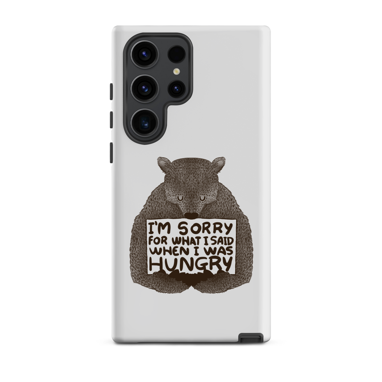 The image shows a humorous, detailed illustration of a bear, drawn in a hand-drawn style, holding a sign that reads 'I'm sorry for what I said when I was hungry.' The bear appears to be apologizing in a comical, endearing manner, making it a relatable and light-hearted design.