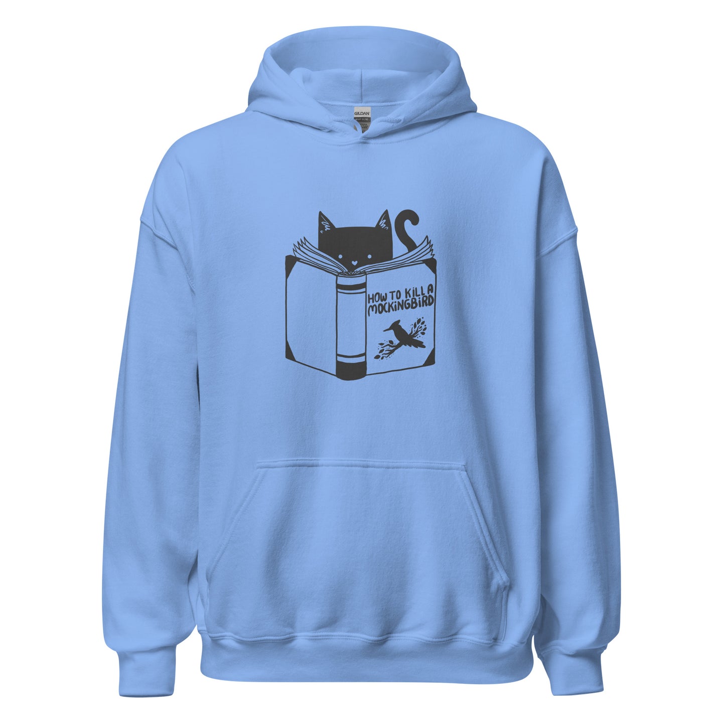 A black and white illustration features a cat peeking over an open book titled 'How to Kill a Mockingbird,' playfully altering the classic novel's title. The cat has a heart-shaped nose and simple, cute facial features. The design is whimsical and ironic, combining classic literature with a humorous twist.