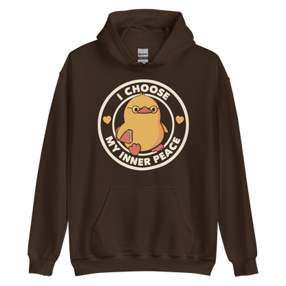 A cute yellow bird with a small tuft of feathers on its head is wearing round glasses and holding a red book. The bird has a determined expression. The image is encircled by the phrase 'I CHOOSE MY INNER PEACE' with two small hearts on each side.