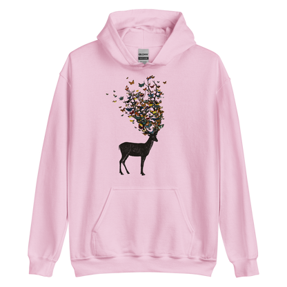 The image depicts a dark, silhouetted deer standing on a neutral background. Instead of branches, its antlers transform into a swirling cloud of vibrant, colorful butterflies that extend upwards and outward. The mix of organic and ethereal elements creates a captivating and whimsical visual contrast.