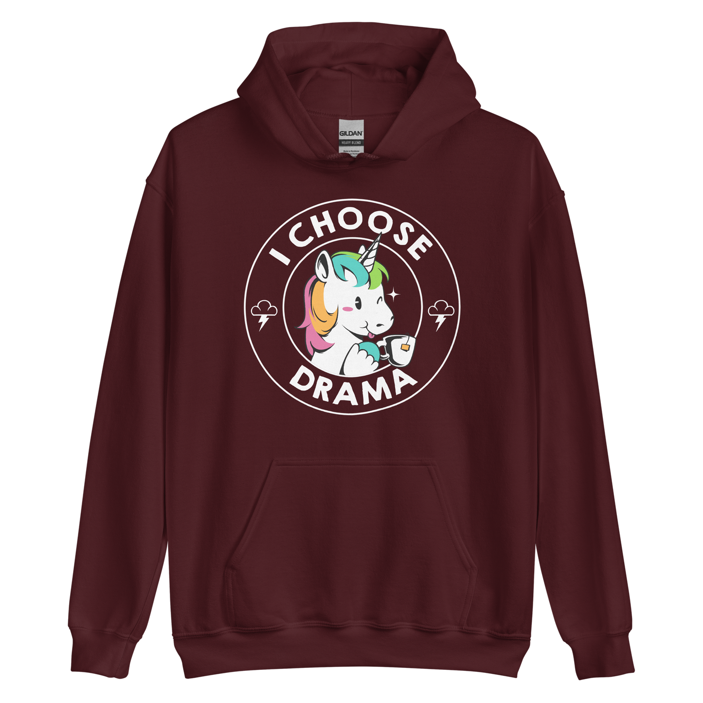 A cartoon unicorn with rainbow-colored mane holds a cup of tea and a heart, encircled by the words 'I Choose Drama'. Two small clouds with lightning bolts flank the unicorn, adding a playful yet slightly edgy vibe. The design is bold and whimsical with a pop-art influence.