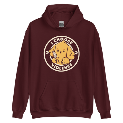 A cute yellow cartoon dog holds a small knife, surrounded by a circular logo that reads 'I Choose Violence'. The dog's expression is serious, yet the overall style is playful and cute. Two small skull icons are on either side, adding an ironic tone to the cheerful design.