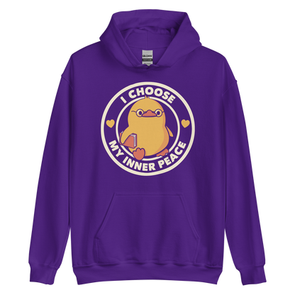 A cute yellow bird with a small tuft of feathers on its head is wearing round glasses and holding a red book. The bird has a determined expression. The image is encircled by the phrase 'I CHOOSE MY INNER PEACE' with two small hearts on each side.