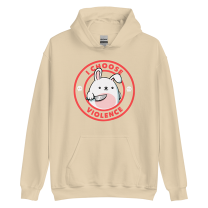 A cute white cartoon bunny with a pink belly stands holding a large kitchen knife in one paw. Surrounding the bunny is a red circular border with the words 'I CHOOSE VIOLENCE'. Small skull icons are on either side of the circle. The overall tone is a mix of adorable and ironic humor.
