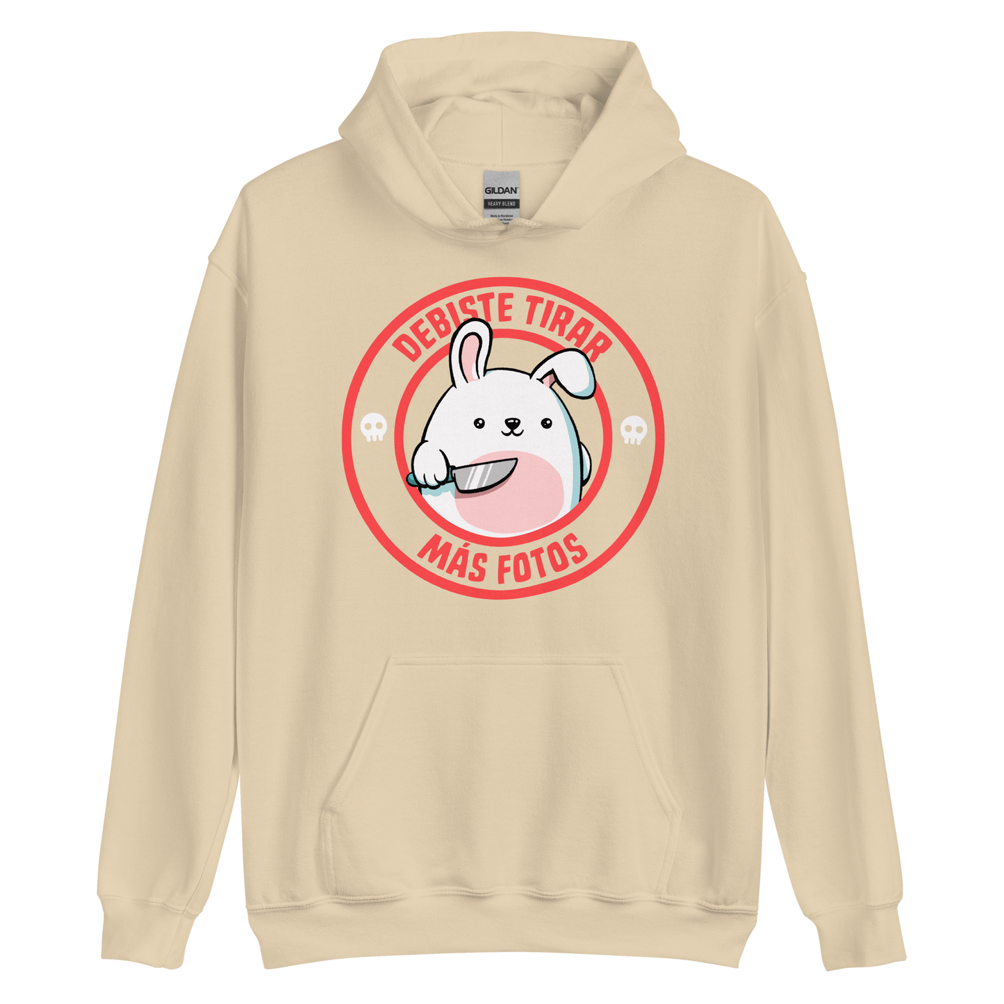 A cute white cartoon bunny with a pink belly stands holding a large kitchen knife in one paw. Surrounding the bunny is a red circular border with the words 'DEBISTE TIRAR MÁS FOTOS'. Small skull icons are on either side of the circle. The overall tone is a mix of adorable and ironic humor.