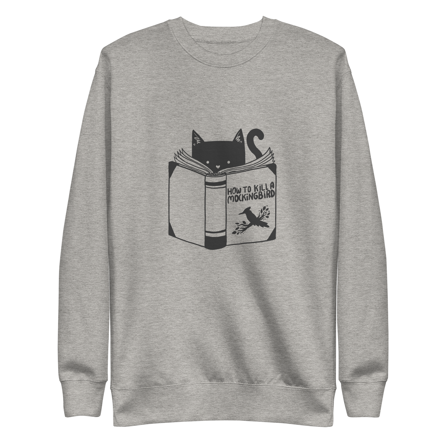 A black and white illustration features a cat peeking over an open book titled 'How to Kill a Mockingbird,' playfully altering the classic novel's title. The cat has a heart-shaped nose and simple, cute facial features. The design is whimsical and ironic, combining classic literature with a humorous twist.