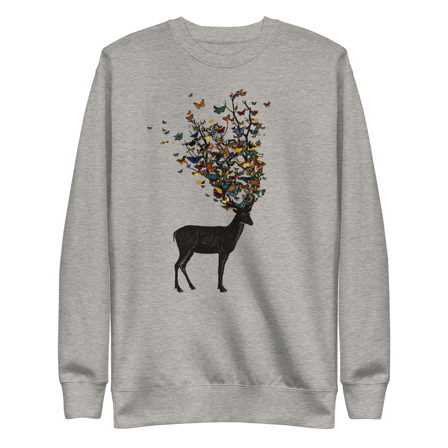 The image depicts a dark, silhouetted deer standing on a neutral background. Instead of branches, its antlers transform into a swirling cloud of vibrant, colorful butterflies that extend upwards and outward. The mix of organic and ethereal elements creates a captivating and whimsical visual contrast.