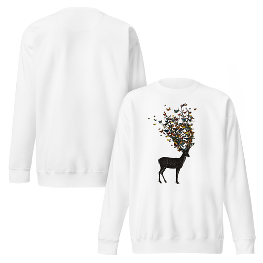 The image depicts a dark, silhouetted deer standing on a neutral background. Instead of branches, its antlers transform into a swirling cloud of vibrant, colorful butterflies that extend upwards and outward. The mix of organic and ethereal elements creates a captivating and whimsical visual contrast.