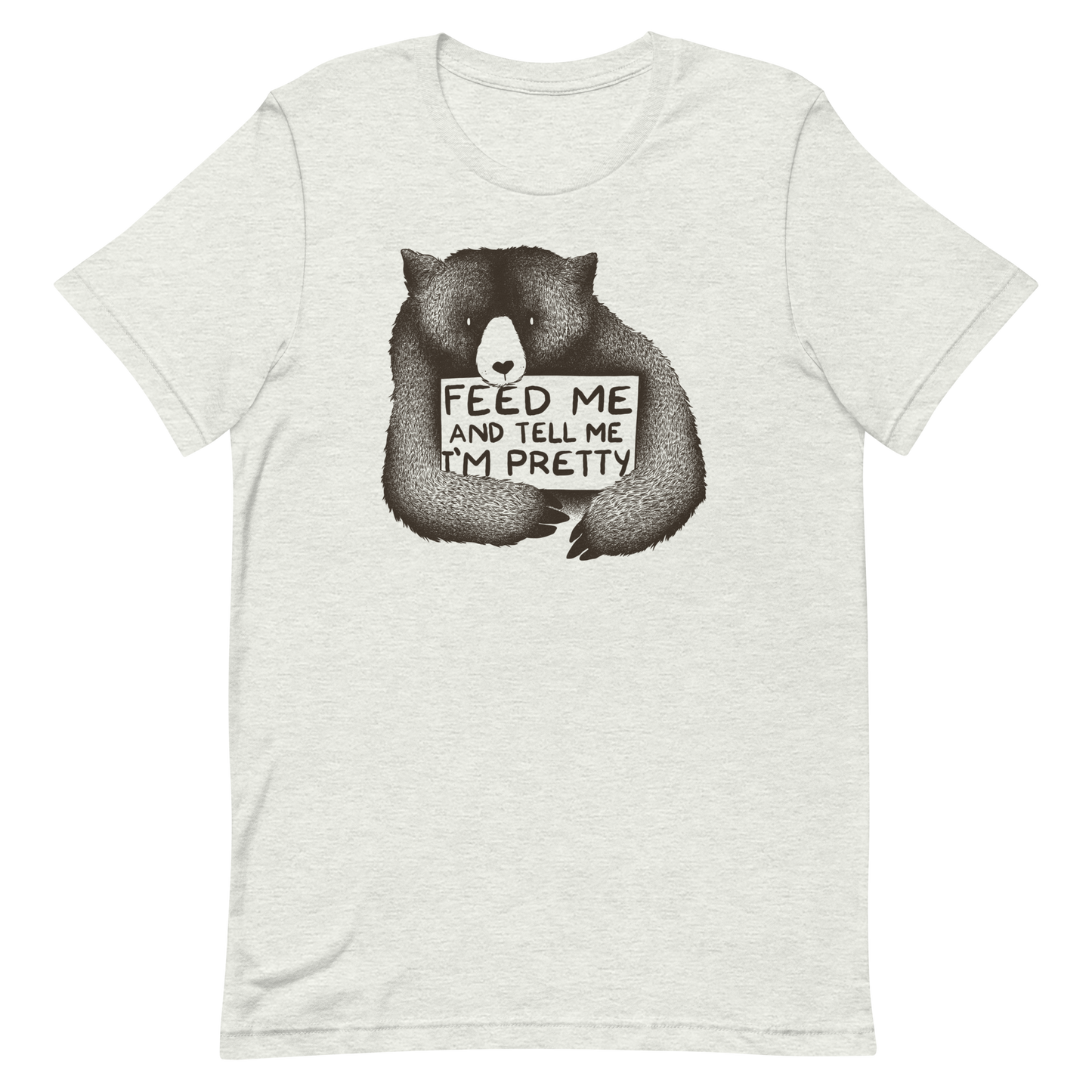 This drawing is of a cute, cartoon-style bear holding a sign with a heart-shaped nose and simple, expressive eyes. The sign reads, 'Feed me and tell me I'm pretty' in a handwritten, playful font. The bear's fur is detailed with fine, textured lines, giving it a cozy, endearing look. The drawing has a monochrome, black-and-white color scheme