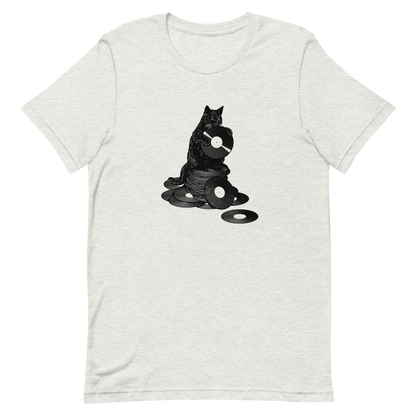 This design features a black cat cozily perched atop a stack of vinyl records, clutching one like it’s pure gold. It’s a tribute to analog lovers, feline charm, and the timeless joy of spinning a record. Perfect for music collectors, cat enthusiasts, and anyone with a nostalgic soul.
