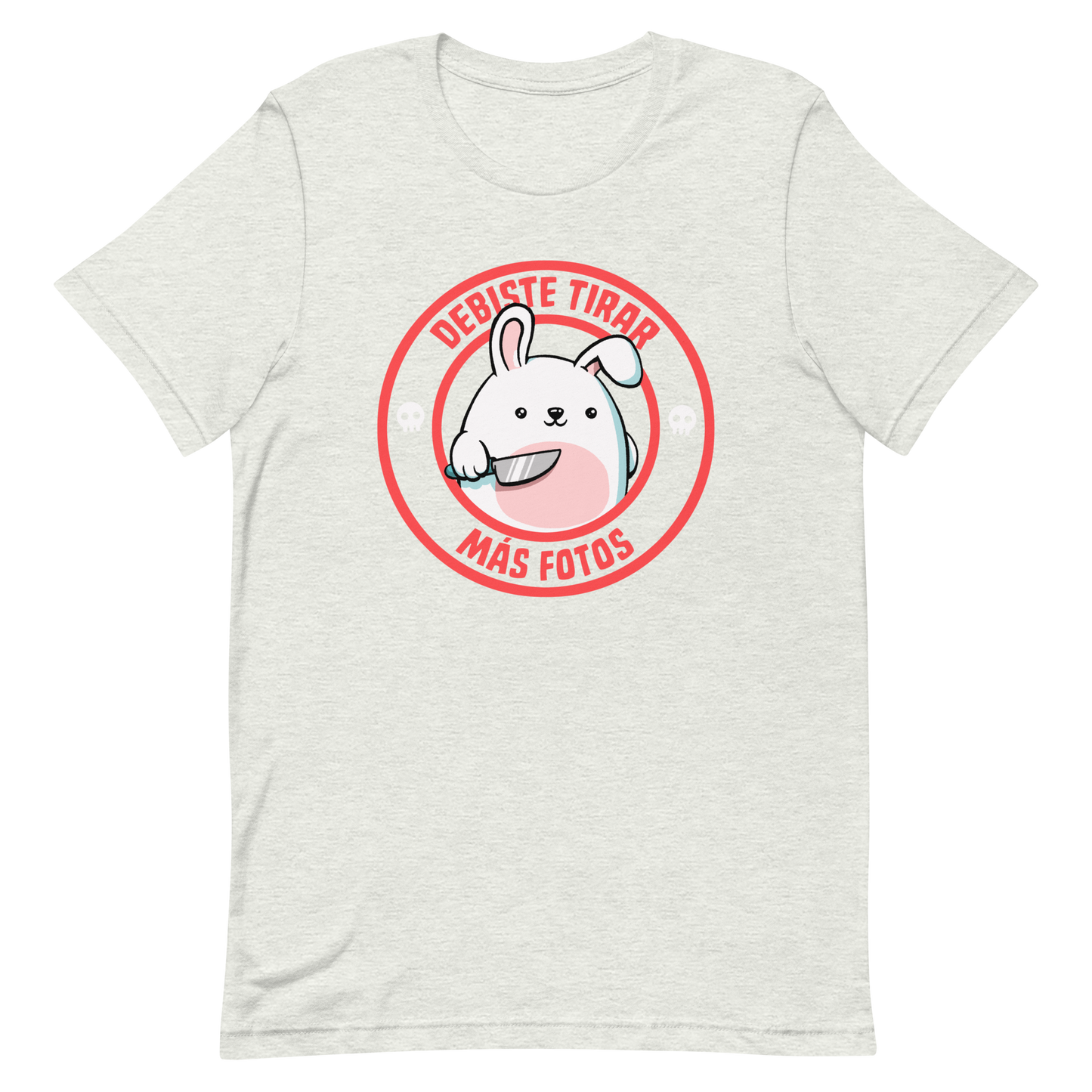 A cute white cartoon bunny with a pink belly stands holding a large kitchen knife in one paw. Surrounding the bunny is a red circular border with the words 'DEBISTE TIRAR MÁS FOTOS'. Small skull icons are on either side of the circle. The overall tone is a mix of adorable and ironic humor.
