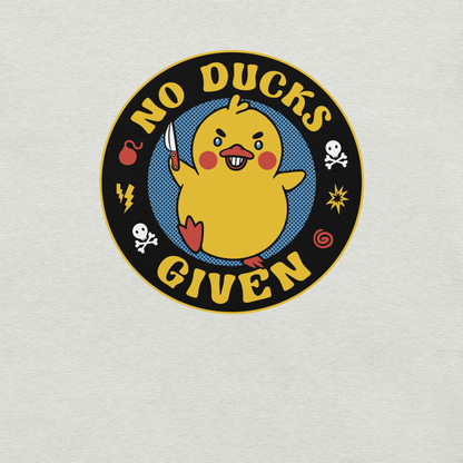 A cute yellow duck holding a small knife, around it the text "No Ducks Given". An art that mixes humor with the temperament of ducks.