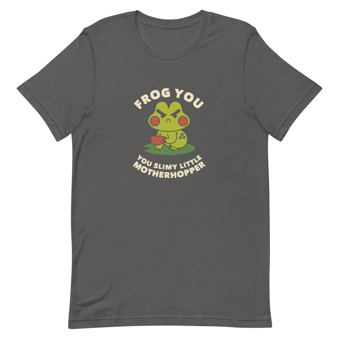 The design features a cartoonish green frog with exaggerated angry features, holding a teacup. The frog has round red cheeks. Above it, text says 'Frog You' and below, 'You Slimy Little Motherhopper'. The style is playful and humorous, reminiscent of cute comic art.