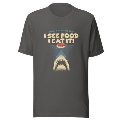 A shark rising from the water toward a floating donut, paired with playful retro typography. The artwork uses visual humor and a classic joke to create a fun, eye-catching composition with strong graphic contrast. Perfect for humor lovers, food fans, and anyone who enjoys witty designs with a slightly cheeky twist.