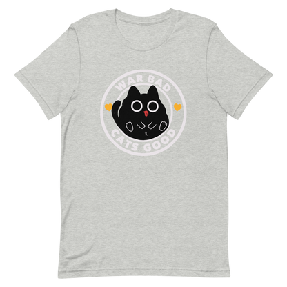 A chubby black cat with big round eyes sits in the center of a circle with the words “War Bad, Cats Good.” This artwork mixes cuteness with a powerful message, reminding us that peace and love always win over conflict. Perfect for cat lovers, peace advocates, and anyone who enjoys playful yet meaningful designs.