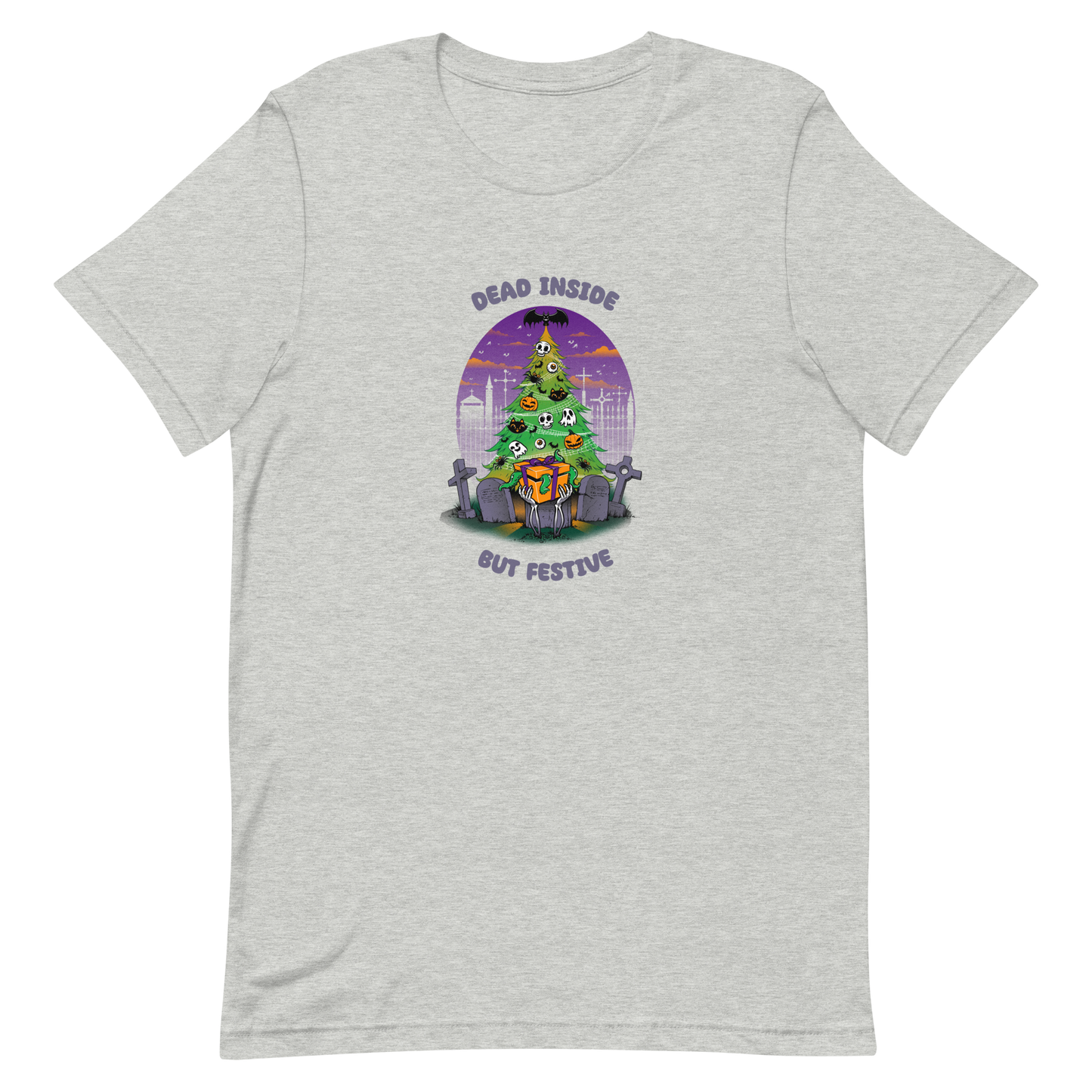 A quirky illustration features a Christmas tree decorated with skulls, pumpkins, and bats, set in a graveyard. The sky is purple and orange, with bats and tombstones surrounding the tree. A skeleton hand holds a festive gift box at the base. Above, text reads "Dead Inside" and below, "But Festive". The design combines Halloween and Christmas elements in a humorous style, highlighting a gothic and festive theme.