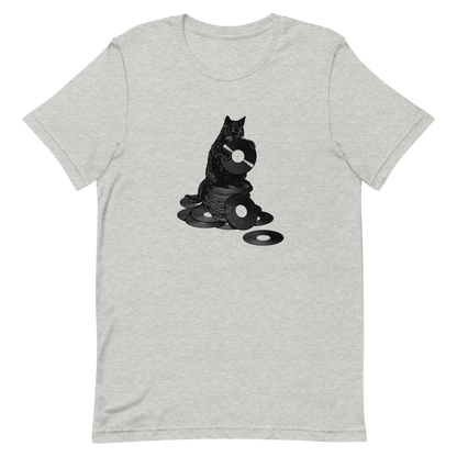 This design features a black cat cozily perched atop a stack of vinyl records, clutching one like it’s pure gold. It’s a tribute to analog lovers, feline charm, and the timeless joy of spinning a record. Perfect for music collectors, cat enthusiasts, and anyone with a nostalgic soul.
