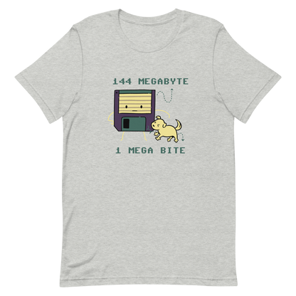 A cute floppy disk stands nervously while a little dog playfully bites its corner, with the text “144 Megabyte / 1 Mega Bite”. This clever pun mixes retro tech nostalgia with a dose of adorable chaos. Perfect for geeks, gamers and anyone who loves a good tech joke.