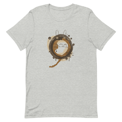 A watercolor-style creature forms a circular shape in soft shades of brown, surrounded by tiny forest spirits. The minimalist ink and watercolor textures create a dreamy, nostalgic atmosphere. Perfect for fans of nature, calm energy, and magical worlds.