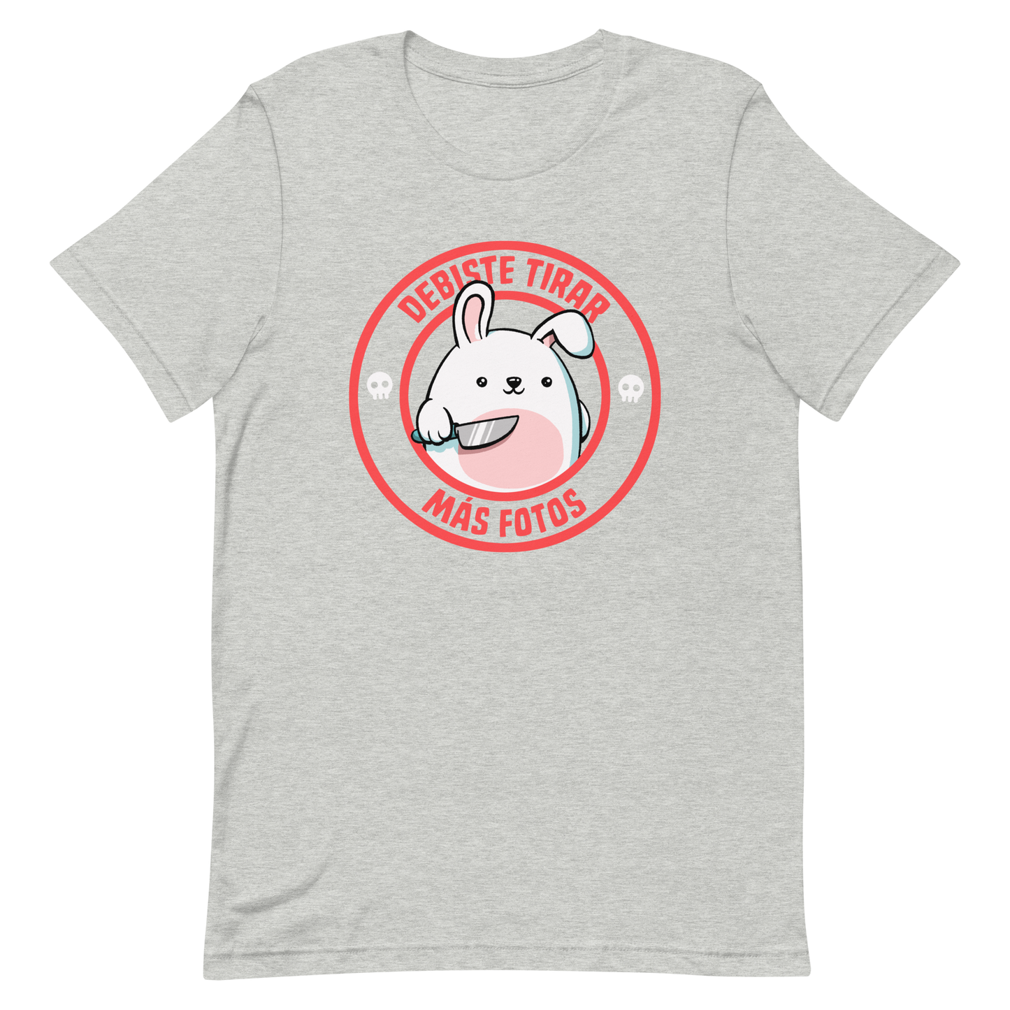 A cute white cartoon bunny with a pink belly stands holding a large kitchen knife in one paw. Surrounding the bunny is a red circular border with the words 'DEBISTE TIRAR MÁS FOTOS'. Small skull icons are on either side of the circle. The overall tone is a mix of adorable and ironic humor.