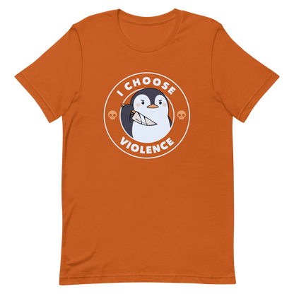 A cartoon-style penguin with a slightly menacing expression holds a large knife. It is surrounded by the words 'I CHOOSE VIOLENCE' in bold uppercase letters. There are two small orange skulls flanking the penguin. The overall design is circular and features contrasting colors for a dramatic effect.