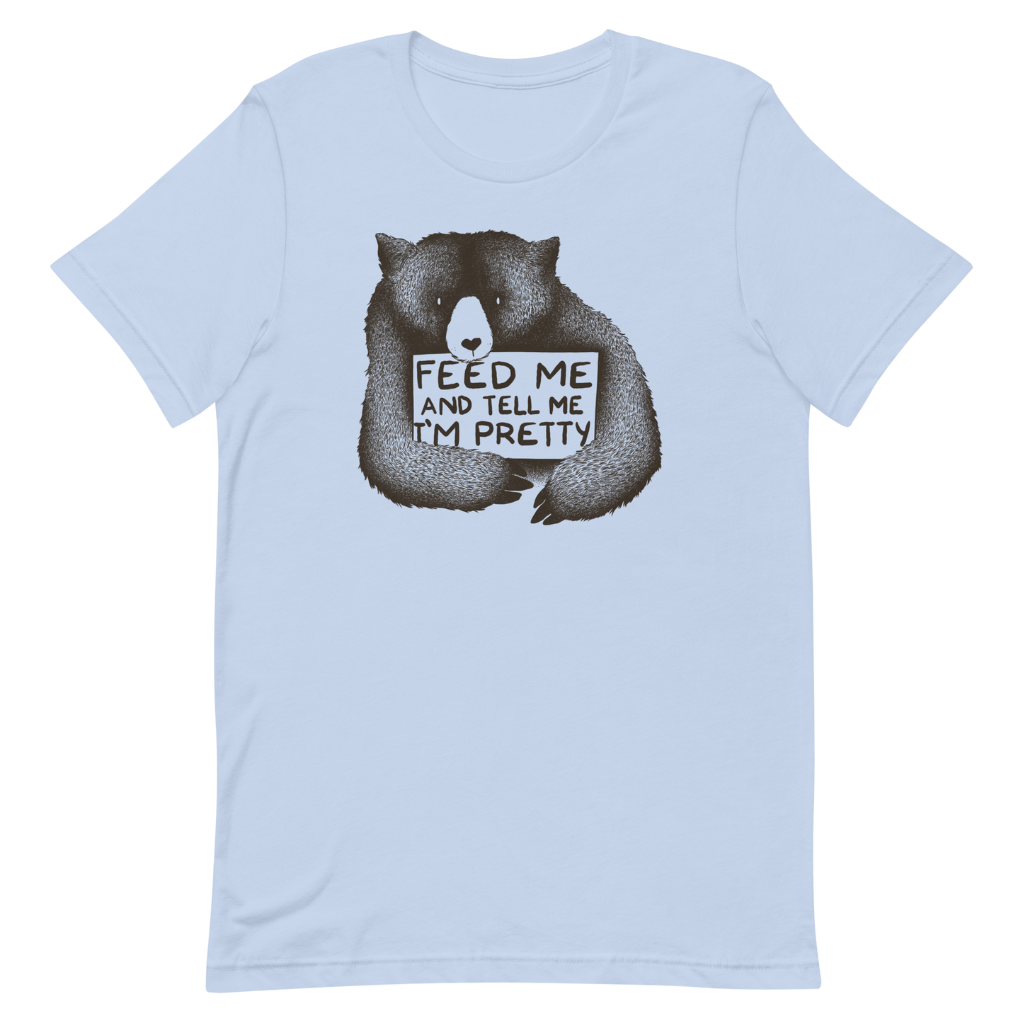 This drawing is of a cute, cartoon-style bear holding a sign with a heart-shaped nose and simple, expressive eyes. The sign reads, 'Feed me and tell me I'm pretty' in a handwritten, playful font. The bear's fur is detailed with fine, textured lines, giving it a cozy, endearing look. The drawing has a monochrome, black-and-white color scheme