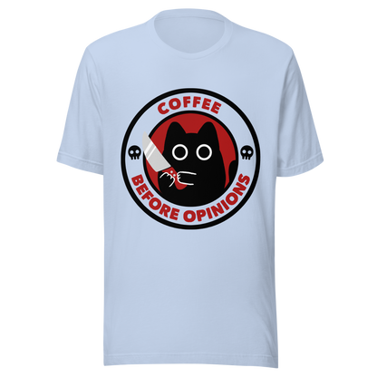 The illustration, in shades of red and black, features a wide-eyed black kitten holding a knife at the centre. Surrounding the cat is the phrase ‘Coffee Before Opinions’. A fun and cheeky gift for those who love cats and can’t function without their coffee.
