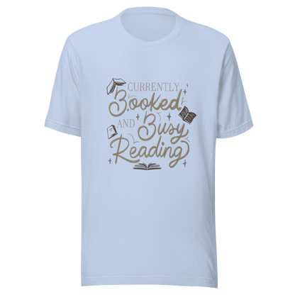 A warm hand-lettered typography featuring the phrase ‘Currently Booked and Busy Reading’, accented with delicate book illustrations and subtle sparkles on a dark background. A cozy, elegant design that celebrates the joy of reading, perfect for book lovers, students, introverts, and anyone who would rather be reading.