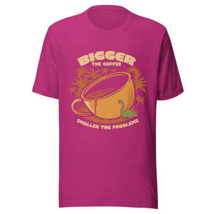 A giant retro-style coffee cup, with a little dinosaur strolling around and palm trees in the background. This design plays on the phrase "Bigger the coffee, smaller the problems," creating a cute and humorous scene about morning survival. Perfect for coffee lovers, dinosaur fans, and those who enjoy fun art.