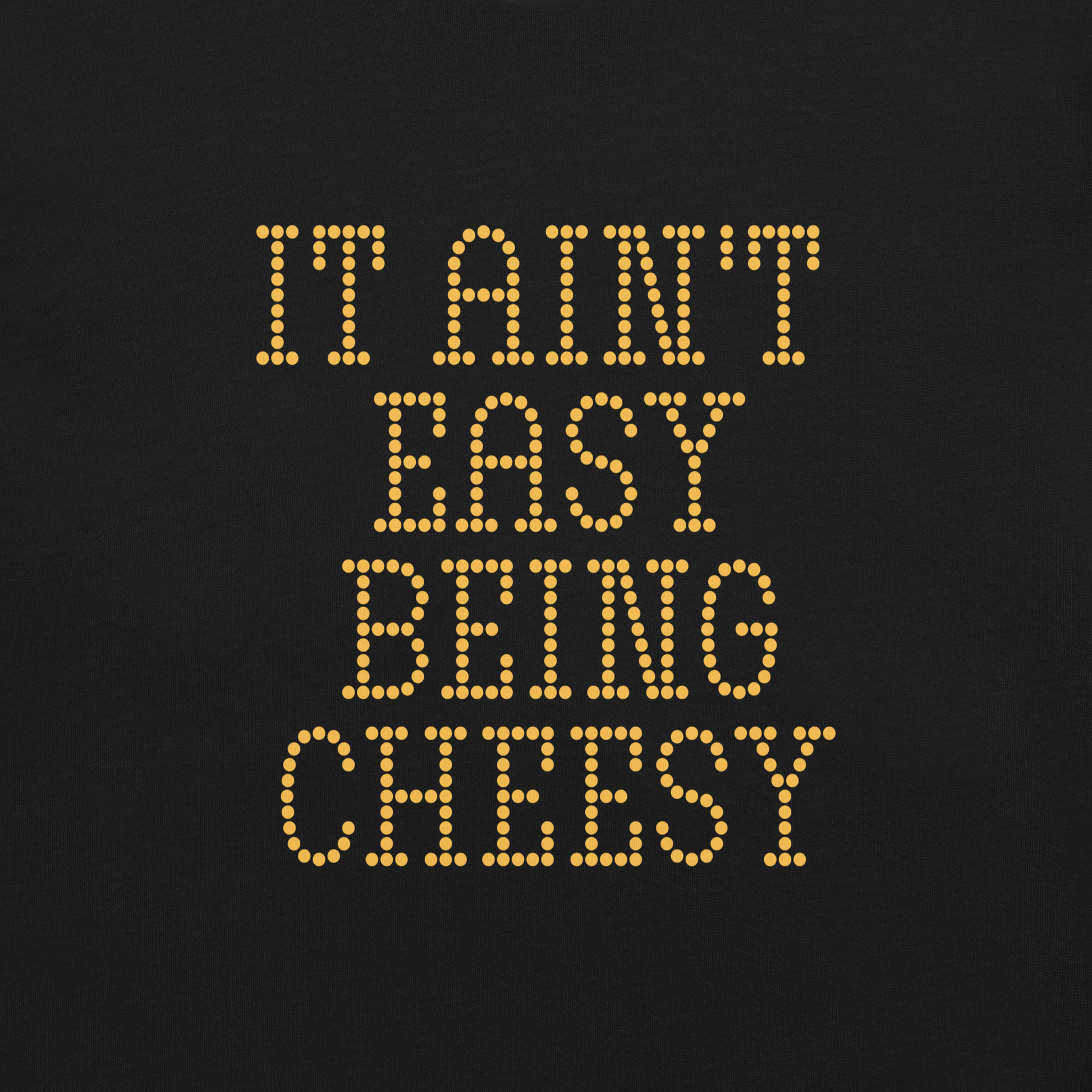 Bold dotted typography spells out ‘It Ain’t Easy Being Cheesy’ in a playful retro style on a yellow background. This funny design mixes wordplay with foodie humor, perfect for pun lovers, cheese fans, retro humor enthusiasts, and anyone who embraces the cringe with pride. A great quirky gift for cheese lovers and humor fans alike.