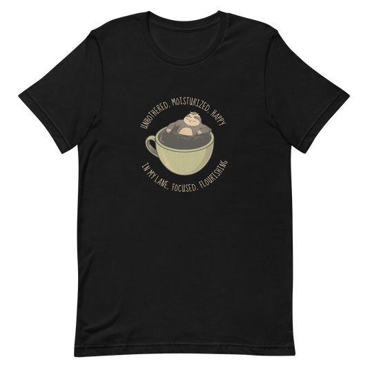 A relaxed sloth floats inside a big cup of coffee, surrounded by the phrase “Unbothered, moisturized, happy, in my lane, focused, flourishing”. This design captures the perfect mix of calm energy and self-confidence. Ideal for coffee lovers, cozy souls and sloth lovers.