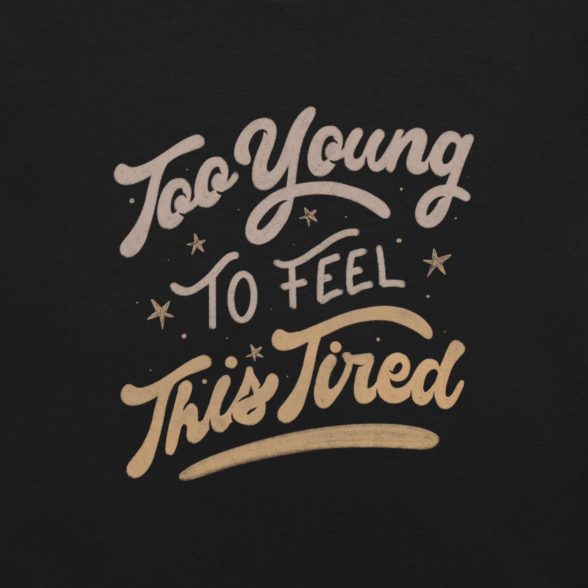The artwork features the vintage-style lettering "Too Young To Feel This Tired," with touches of beige and gold, decorated with small stars. This playful phrase conveys the feeling of premature fatigue with an ironic and stylish touch. Ideal for young adults, students, and anyone who can relate to the daily struggle between energy and exhaustion.