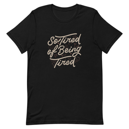 The artwork features the retro-style lettering "So Tired of Being Tired" surrounded by small icons like stars, hearts, clouds, and spider webs. This composition expresses the feeling of constant fatigue in a fun and stylish way. Ideal for those who bring humor to life and those who experience exhaustion in a lighthearted and humorous way.