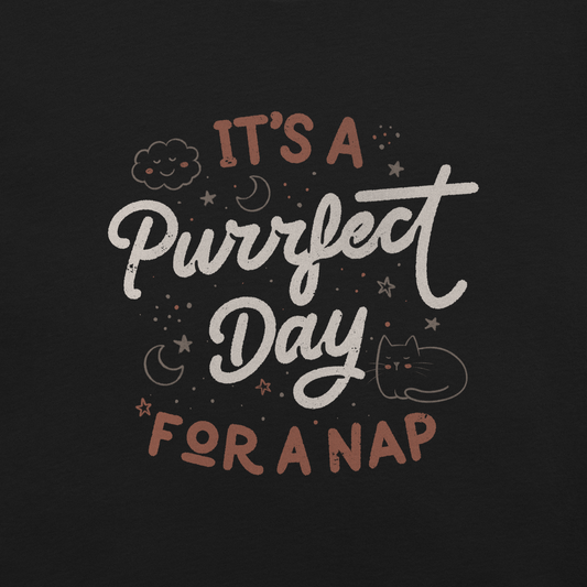 The artwork features the lettering "It's a Purrfect Day for a Nap" in a cute retro style, with a smiling cloud, stars, moons, and a relaxing kitten. This composition plays on the pun of "purrfect" and conveys all the charm of felines in their favorite moment: napping. Ideal for cat lovers, fans of funny phrases, and those who love to transform laziness into a lifestyle.