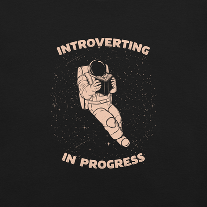 An astronaut floats in space while reading a book, surrounded by twinkling stars. The artwork represents the beauty of introspection and a quiet retreat amidst the universe. Perfect for introverts, passionate readers and dreamers who love the combination of space and tranquility.