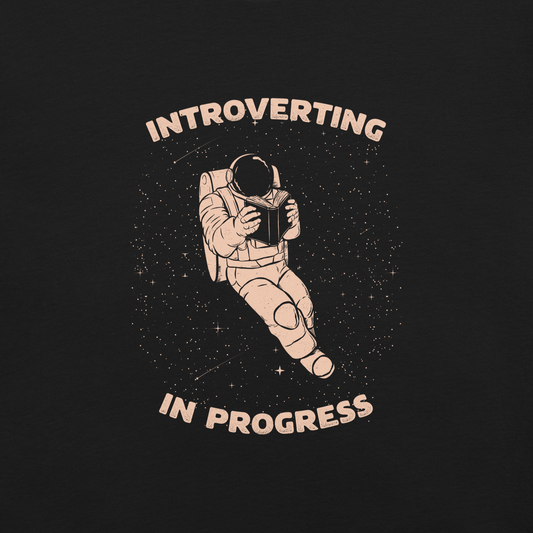 An astronaut floats in space while reading a book, surrounded by twinkling stars. The artwork represents the beauty of introspection and a quiet retreat amidst the universe. Perfect for introverts, passionate readers and dreamers who love the combination of space and tranquility.