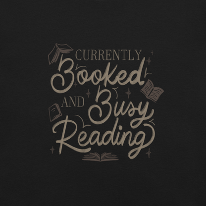 A warm hand-lettered typography featuring the phrase ‘Currently Booked and Busy Reading’, accented with delicate book illustrations and subtle sparkles on a dark background. A cozy, elegant design that celebrates the joy of reading, perfect for book lovers, students, introverts, and anyone who would rather be reading.